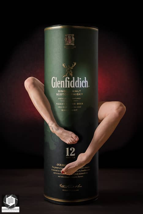 photo manipulation with glenfiddich whiskey and a woman's legs